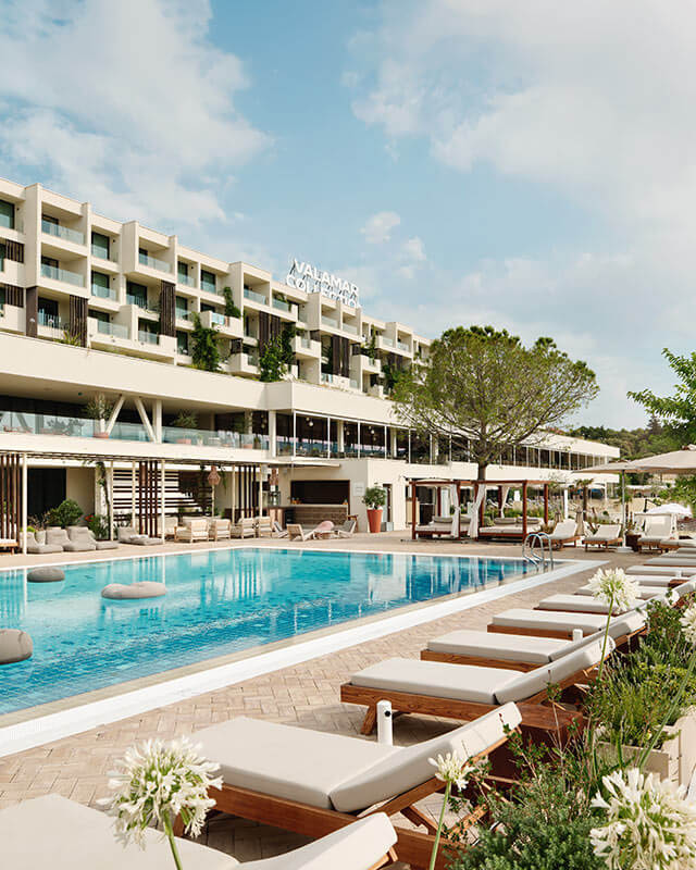 Aerial view of Arba Resort on Rab Island with pools, water park and beachfront