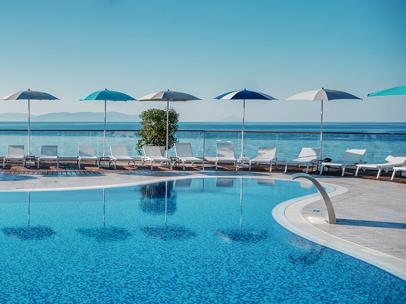 The Maro mascot and children playing on the Splash playground in Girandella Valamar Collection Resort