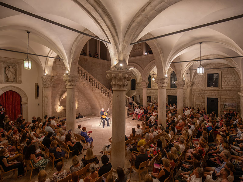 Cultural event in Croatia with music and traditional costumes