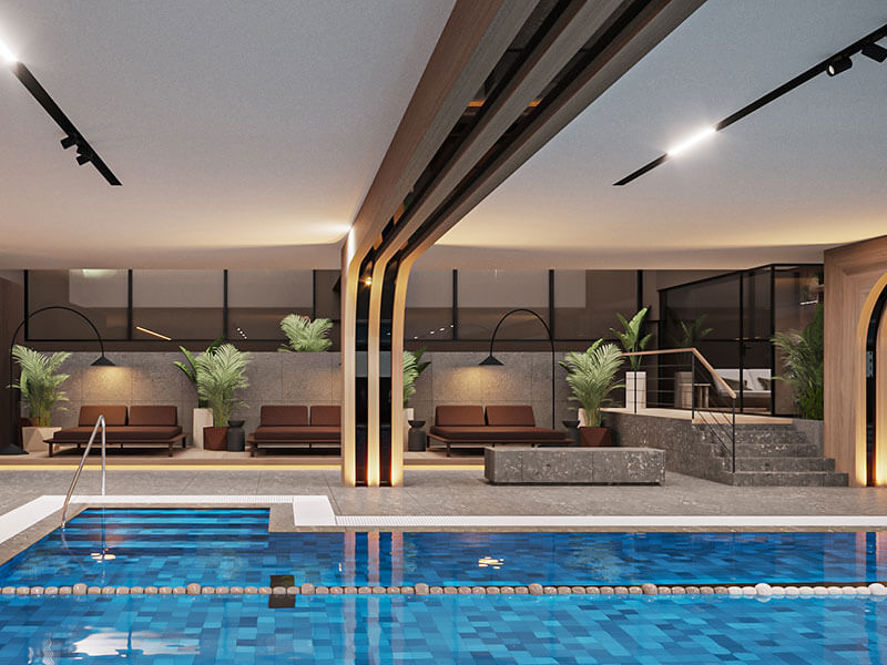 Piscine intérieure avec un espace détente moderne au Valamar Diamant Hotel.