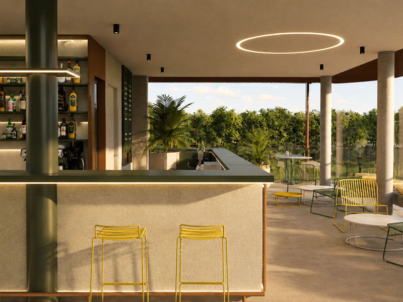 Bar counter with seating and a view of the tennis courts at Racket Club, Valamar Diamant Hotel.