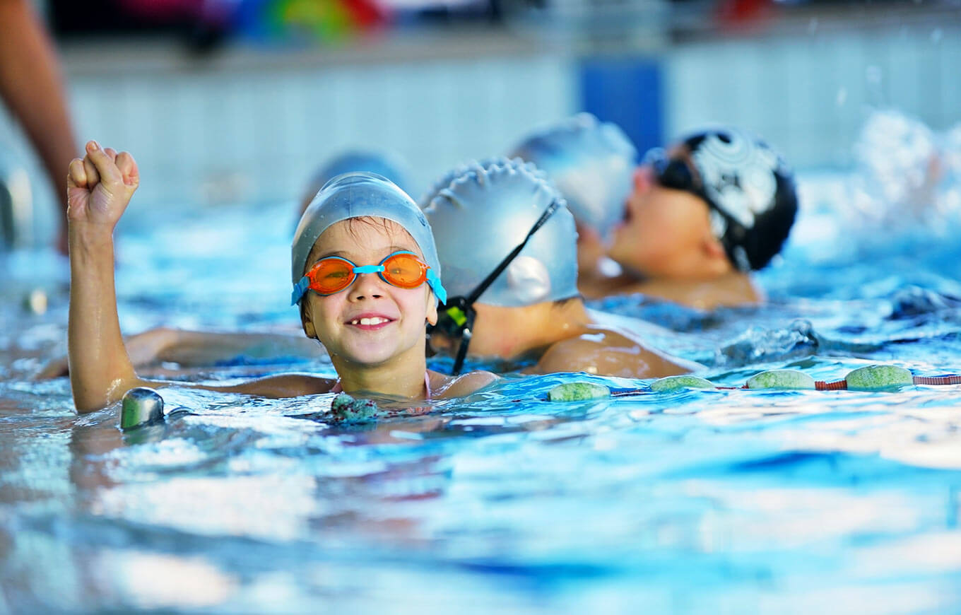 Children enjoying swimming lessons as part of Sport Academies & Camps at Valamar Diamant Hotel.