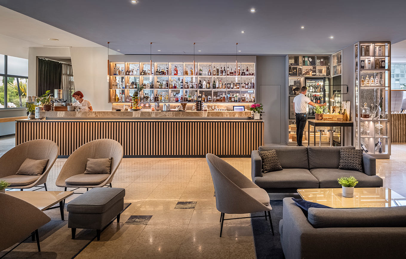 Zing Bar by the hotel reception with modern lounge area and drinks selection