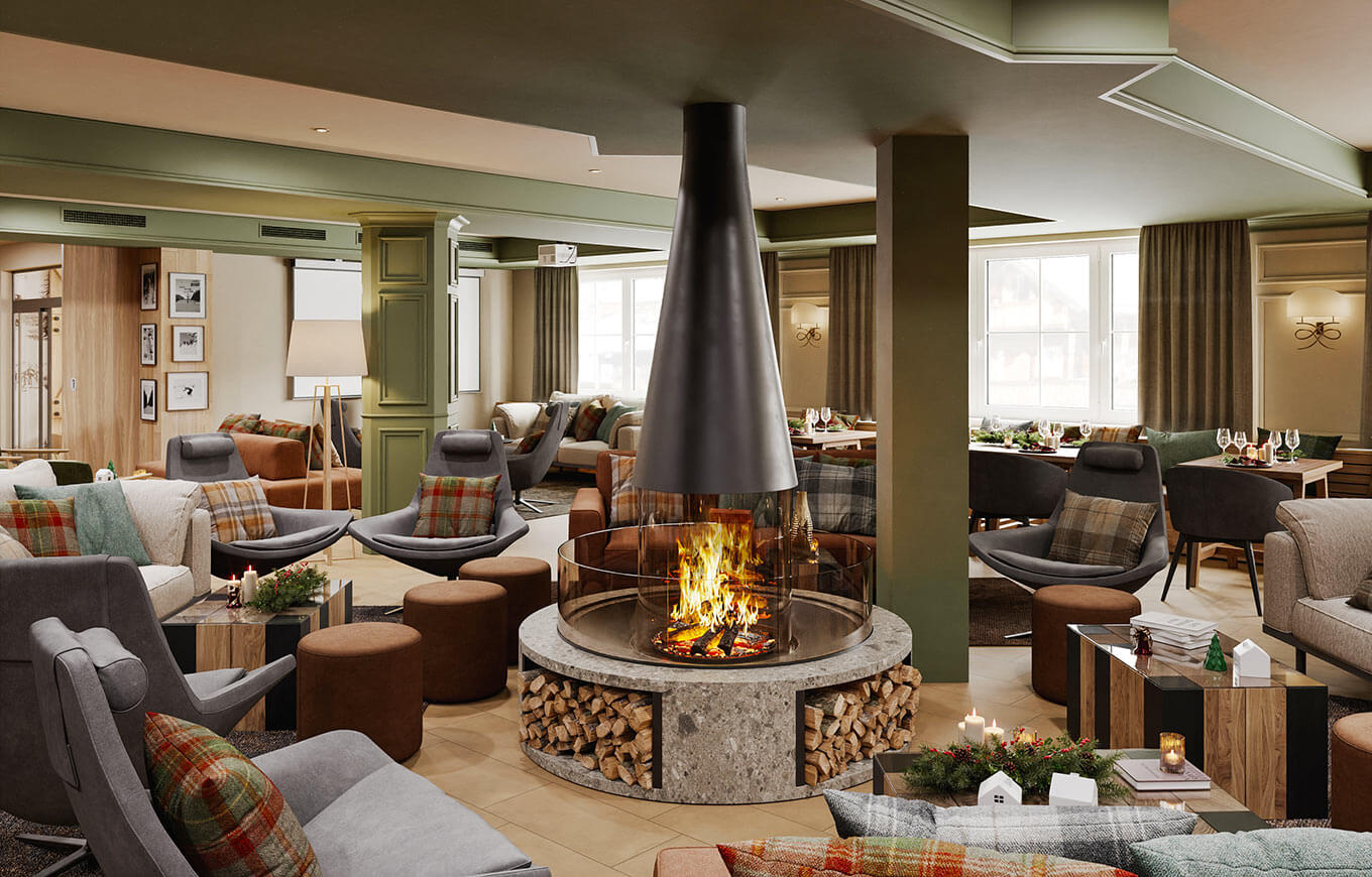 Lobby with couches and fireplaces at Valamar Obertauern Hotel