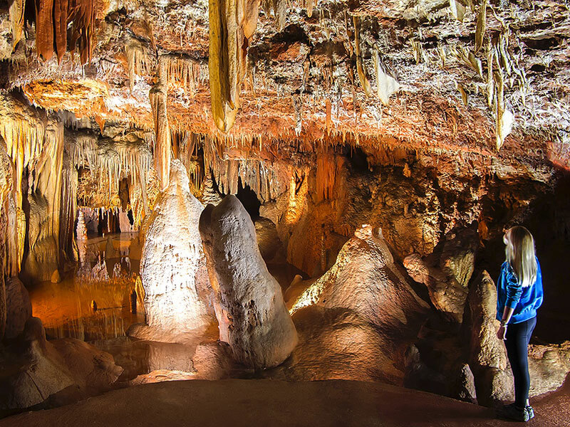 Guided tour inside Baredine Cave with stalactites and stalagmites