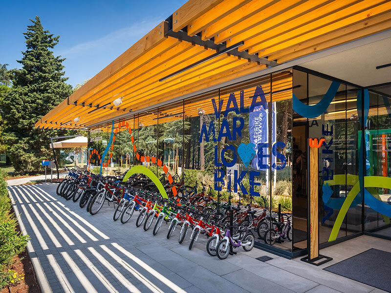 Bike Center Poreč entrance with a range of rental bikes available