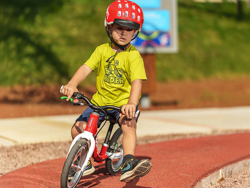 Child riding on the kids' cycling track at Bike Center Poreč