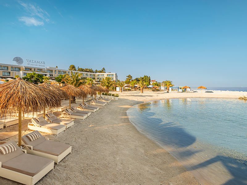 Marea Sandy Family Beach with shallow waters and sandy shore