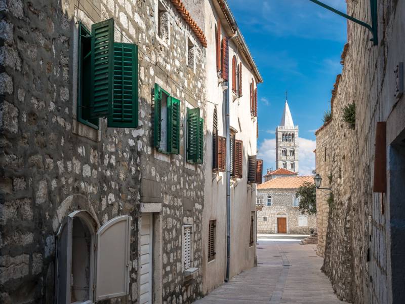 View of Rab old town’s historic buildings and church towers