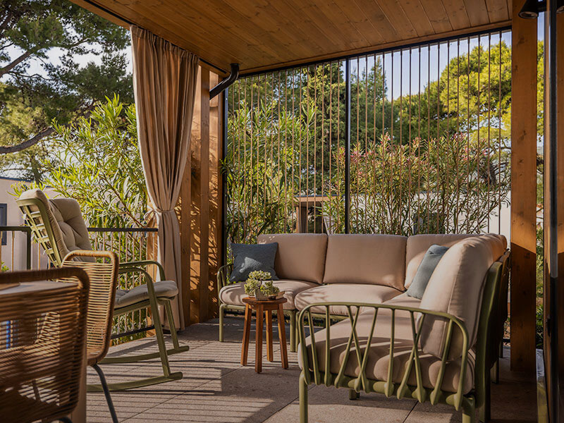 Eco-conscious seating area surrounded by greenery