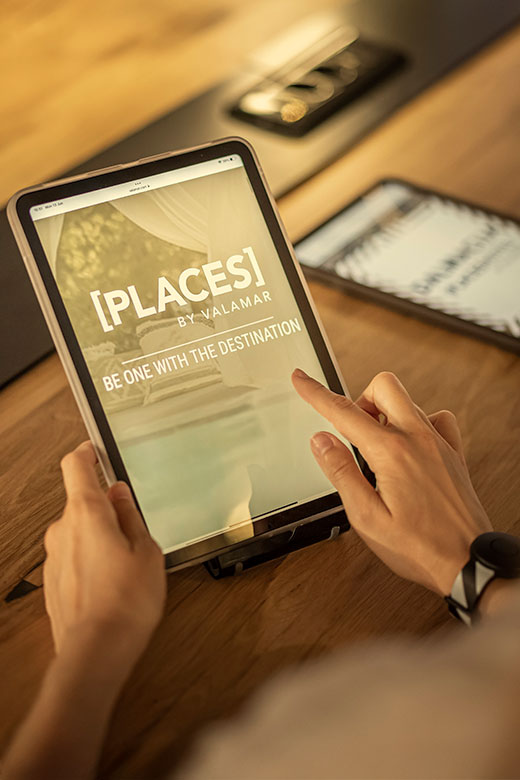 A tablet with [PLACES] by Valamar on the screen